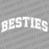 Bold white varsity style text saying BESTIES in an arched collegiate font DTF transfer ready to press.