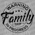Circular black stamp design saying Warning Family Trip In Progress with stars and elegant script DTF transfer ready to press.
