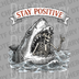 Vintage woodcut style illustration of a skeleton captain with a thumbs up inside a shark's mouth with a Stay Positive banner DTF transfer ready to press.